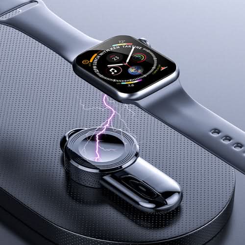 Apple iWatch USB Charger with charging cable and smartwatch on gray surface