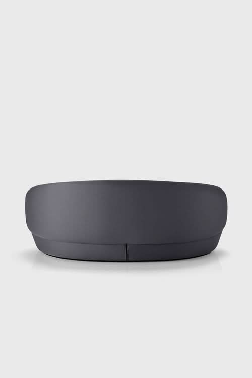 Naïve Sofa, dark gray curved design, side view