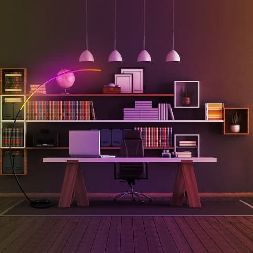 RGBW Modern Curve Floor Lamp in home office setting with shelving and desk workspace