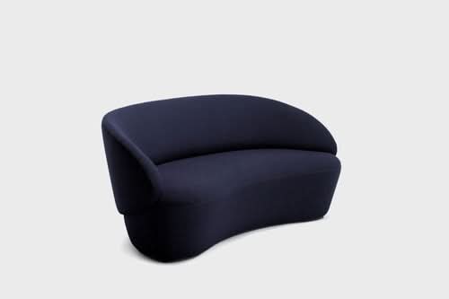 Naïve Sofa in dark navy with curved, rounded silhouette