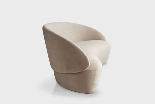 Naïve Sofa in cream upholstery with curved modern silhouette