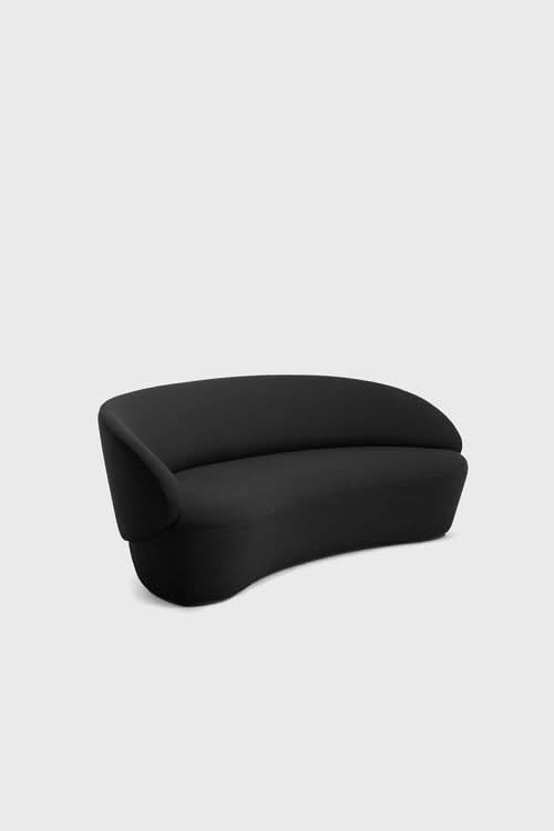 Naïve Sofa in black with curved rounded design and padded armrests