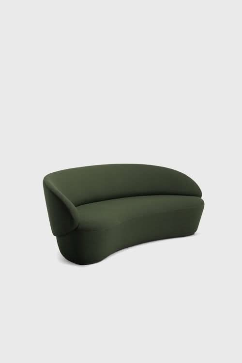 Naïve Sofa in olive green with curved armrests and rounded silhouette