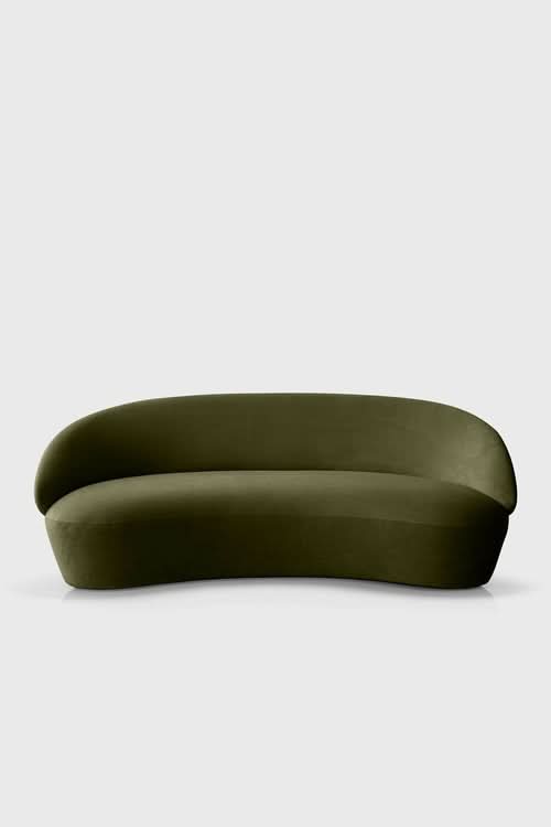 Naïve Sofa in olive green with curved, rounded silhouette against a neutral background
