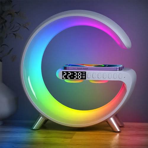 Circular LED light with integrated digital clock display and wireless charging pad on top
