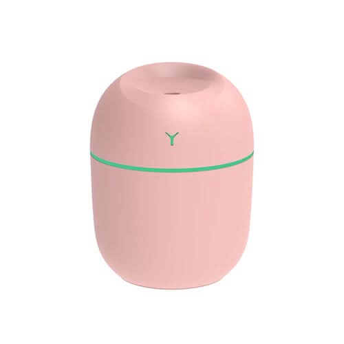 Pink portable ultrasonic humidifier with green accent band and LED light