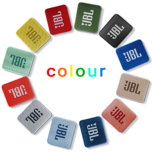 JBL GO 2 speakers arranged in a circle in multiple colors including yellow, red, green, black, blue, gray, and pink
