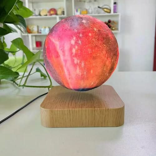 3D Print Moon Lamp with touch control and magnetic levitation, glowing red-pink on wooden base