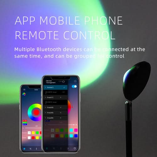 Two smartphones displaying rainbow color control app interface beside a black remote control device