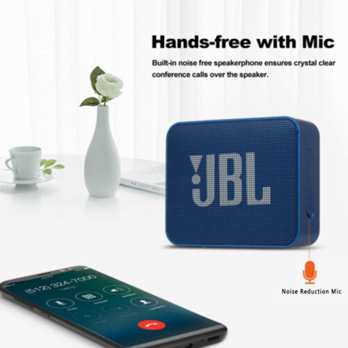 JBL GO 2 wireless speaker in blue with noise reduction mic, phone showing call interface, and desktop scene