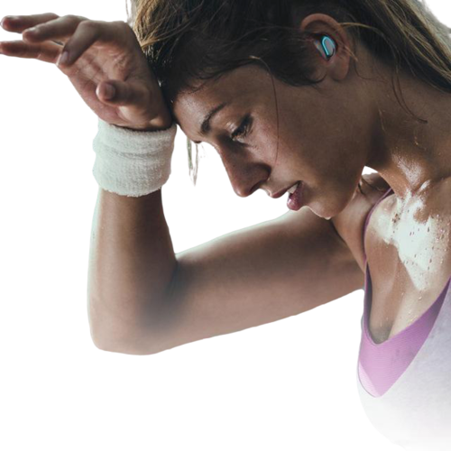 Person wearing blue wireless earbuds during workout, wrist sweatband visible